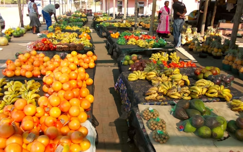 Shoppers browsing fruit stalls in an Anambra market